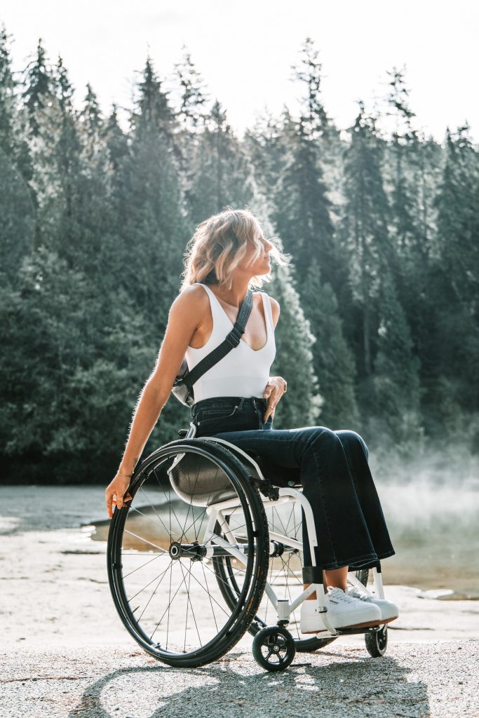 young lady sitting in a lightweight wheelchair